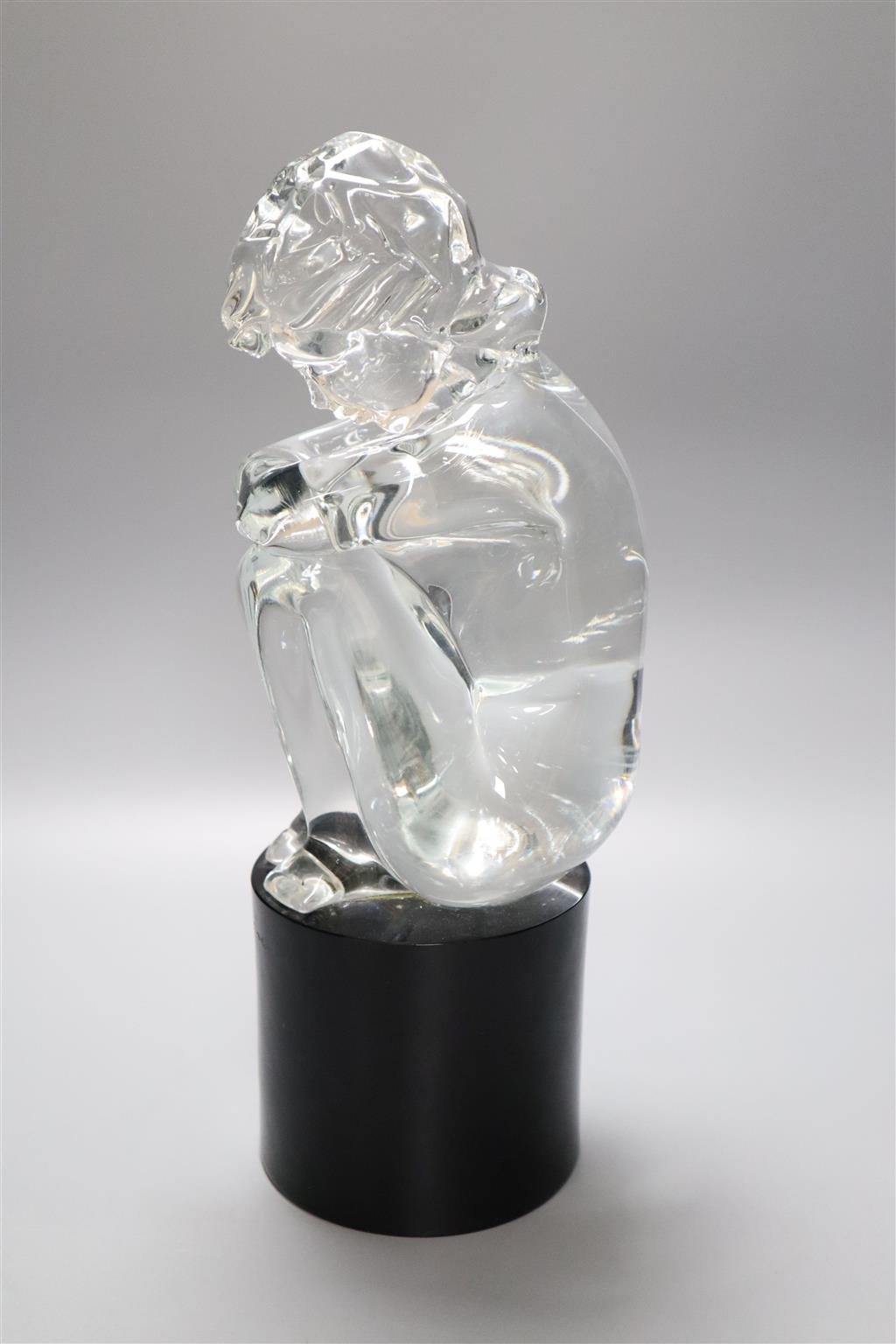 A Murano glass sculpture of a female seated on a black cylindrical glass plinth, signed L. Rosici, 38cm